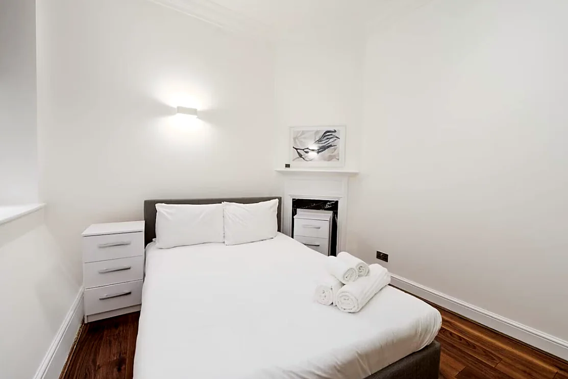 Bedroom with double bed and drawers