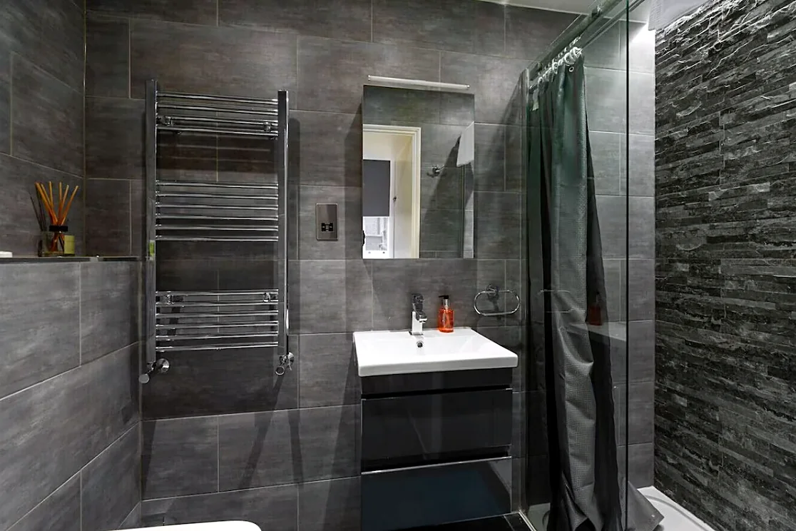 Shower room with heated towel rail