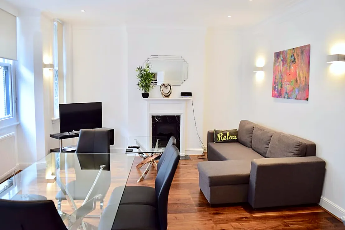 Living room with corner sofa and fireplace