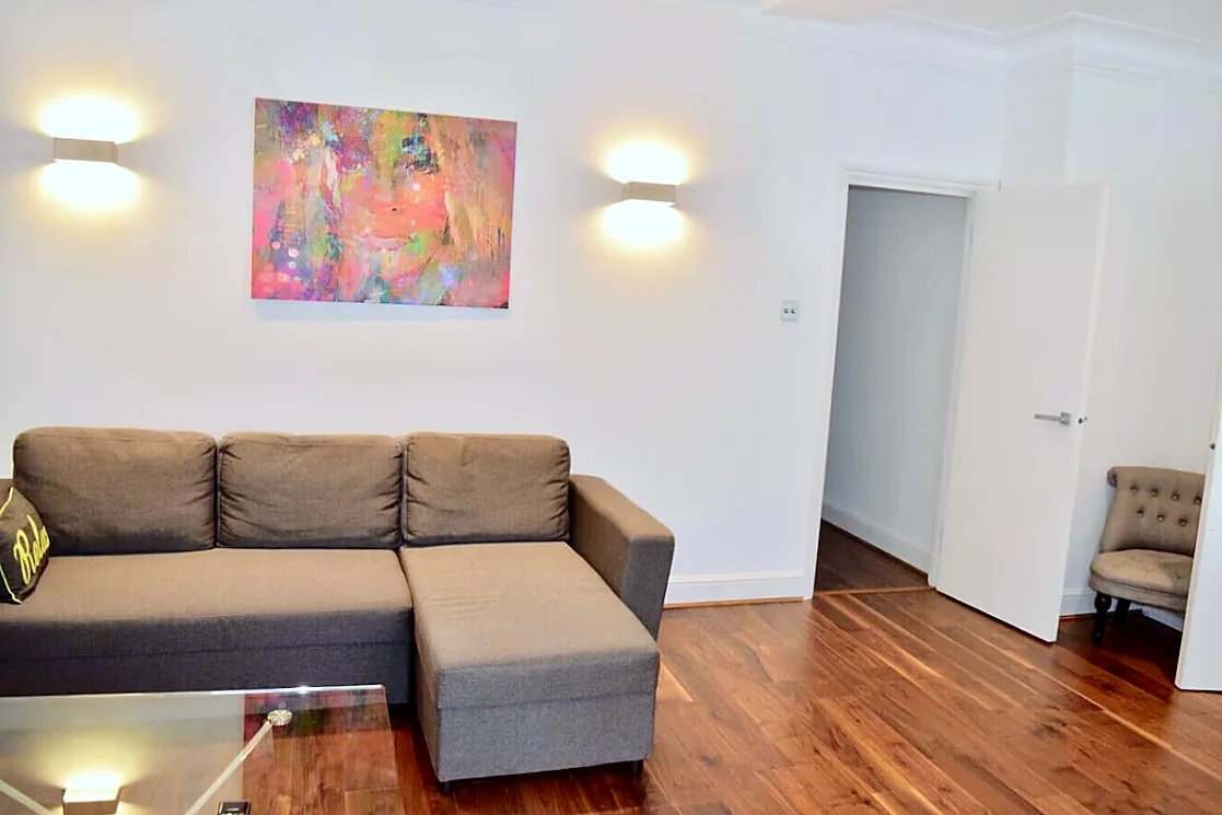 Living room with sofa and wall art