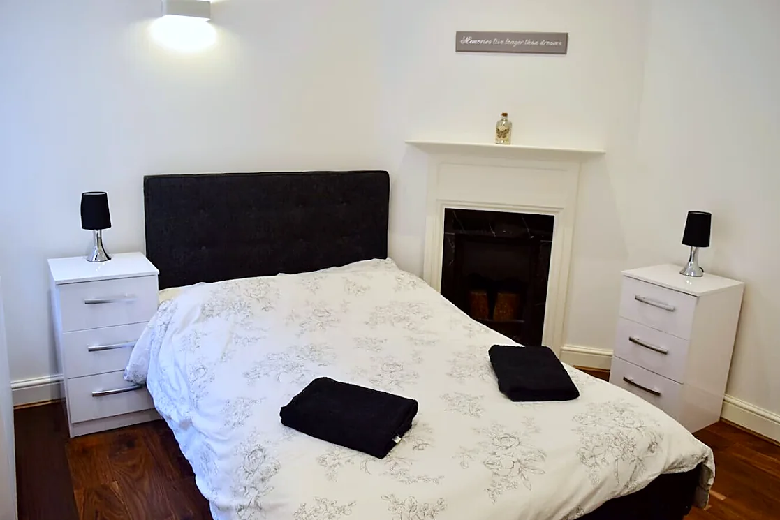 Bedroom with fireplace