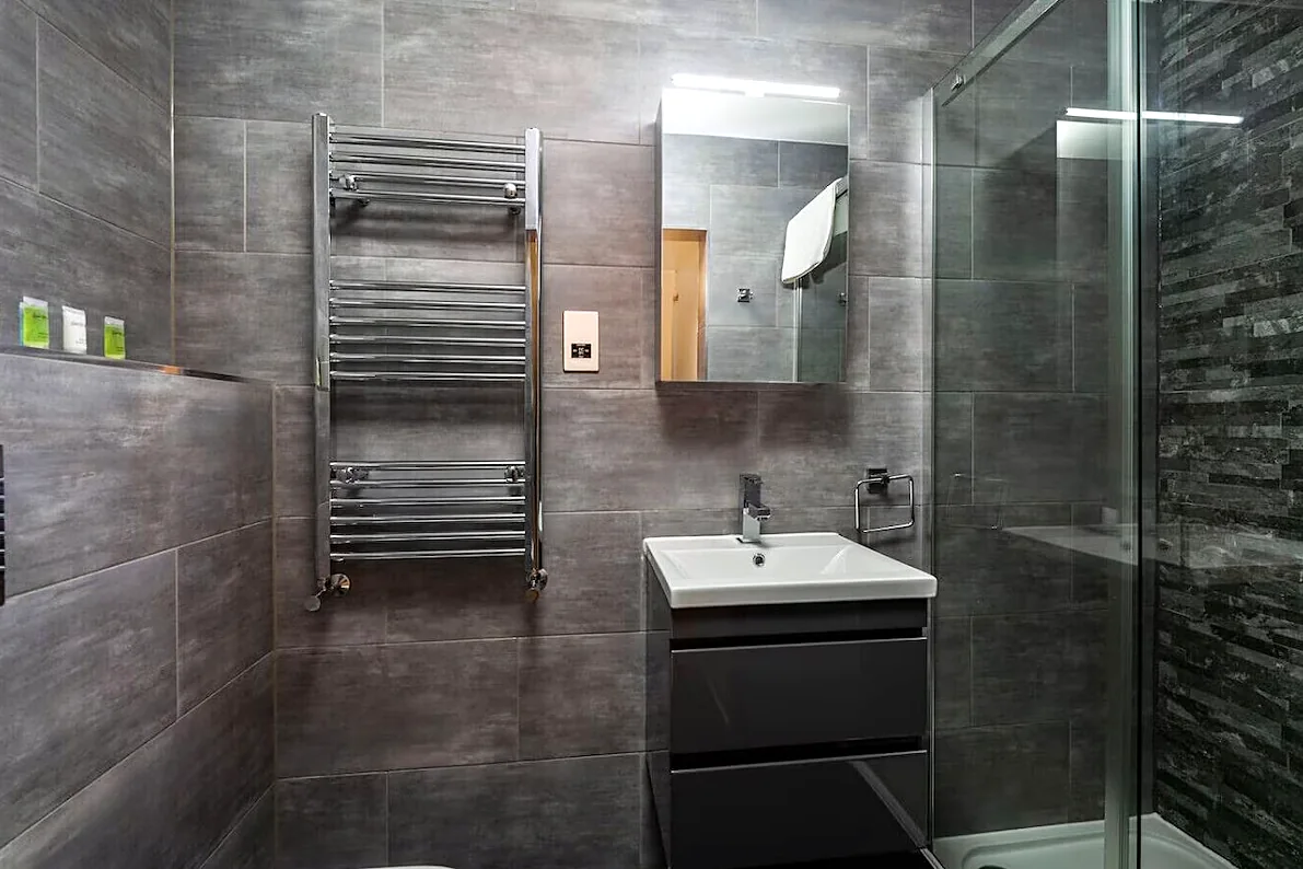 Shower room with heated towel rail