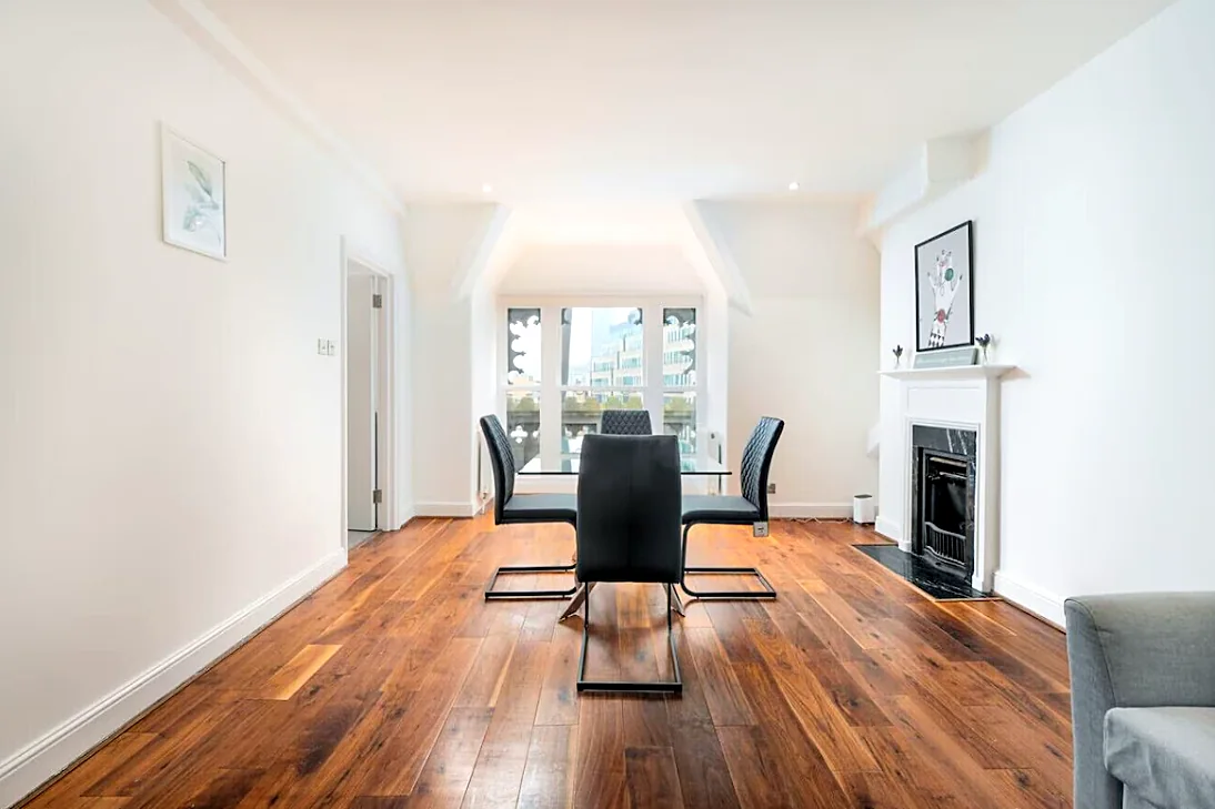 Dining table by the arched window