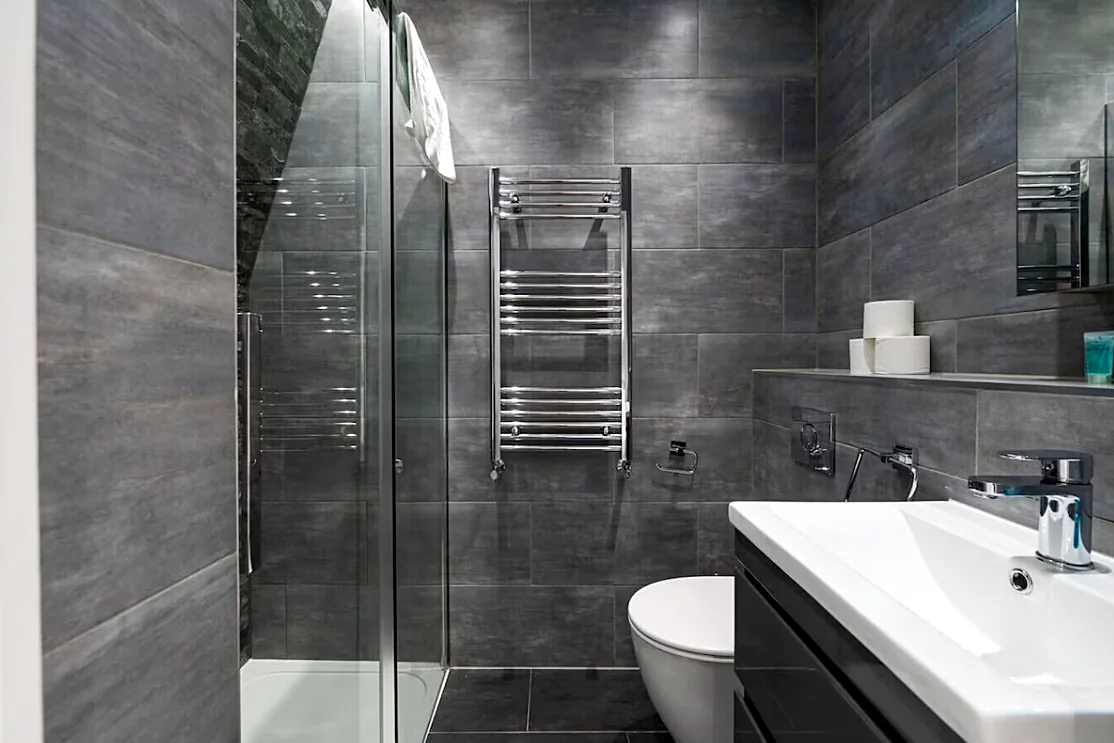 Shower room with heated towel rail